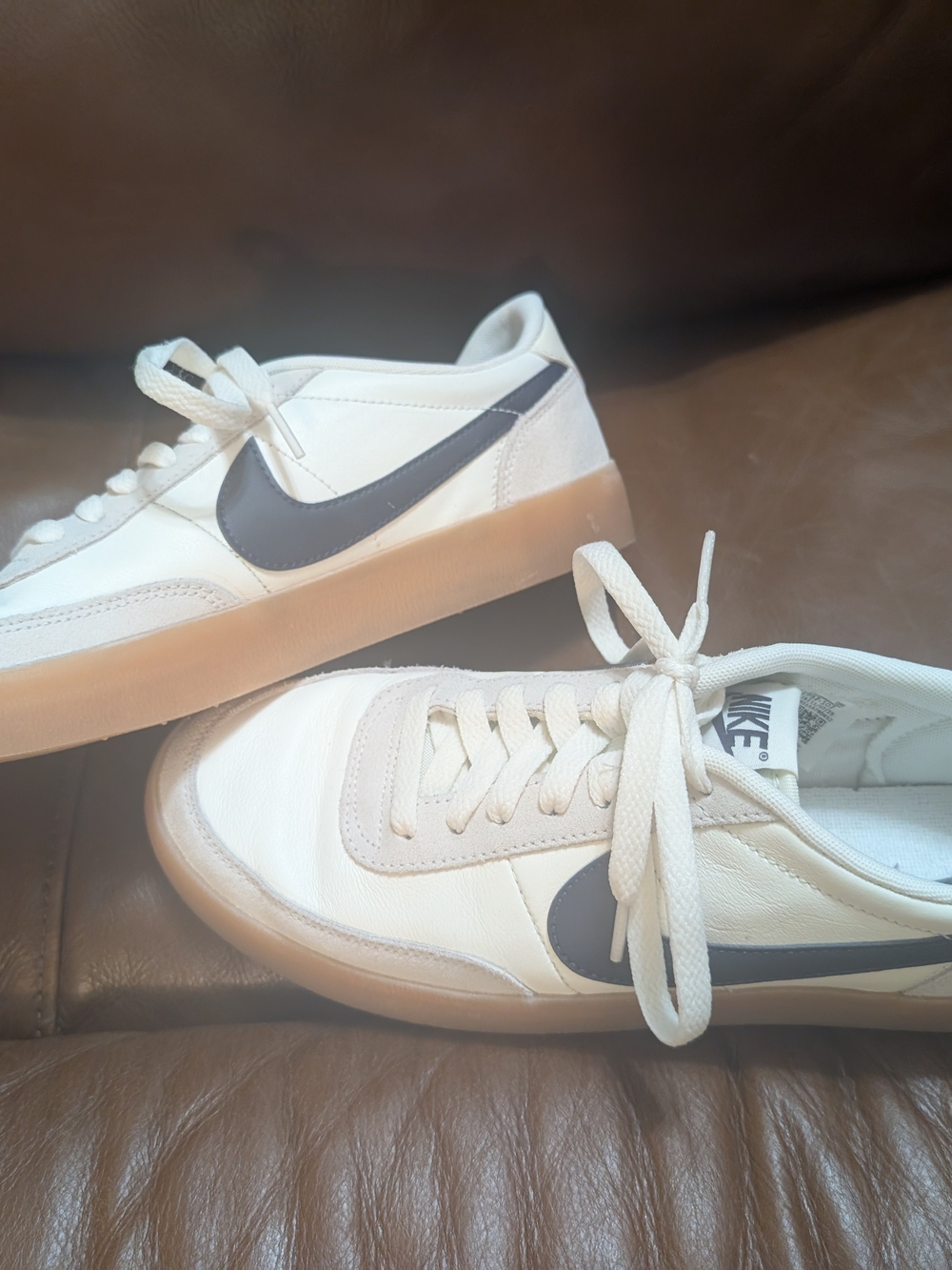 Nike Men’s White Leather Sneakers with Black Swoosh